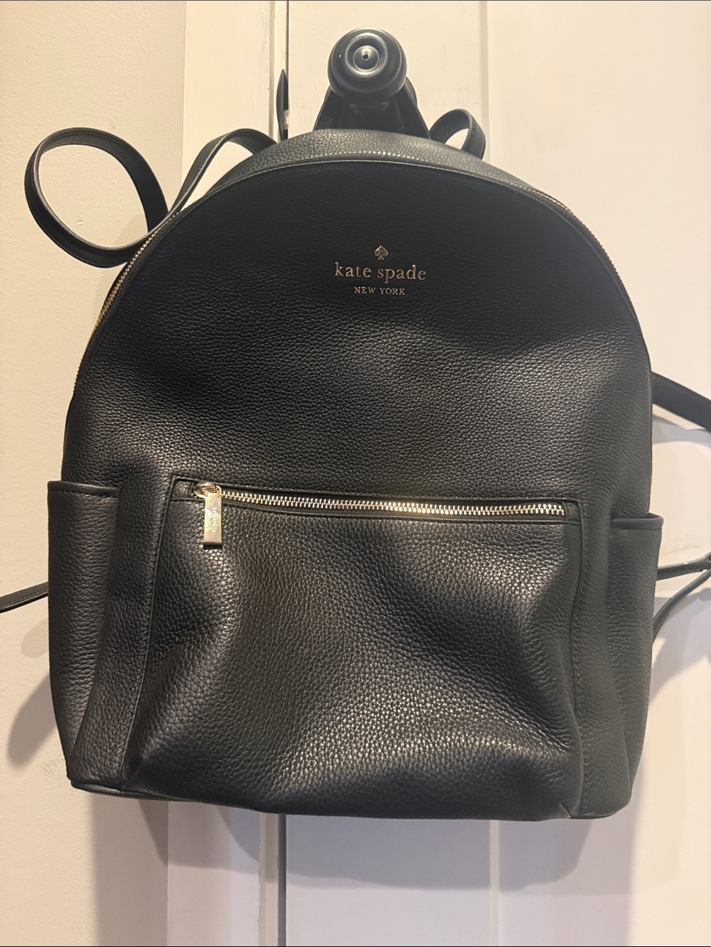 kate spade Black Pebbled Leather Backpack with Gold Accents